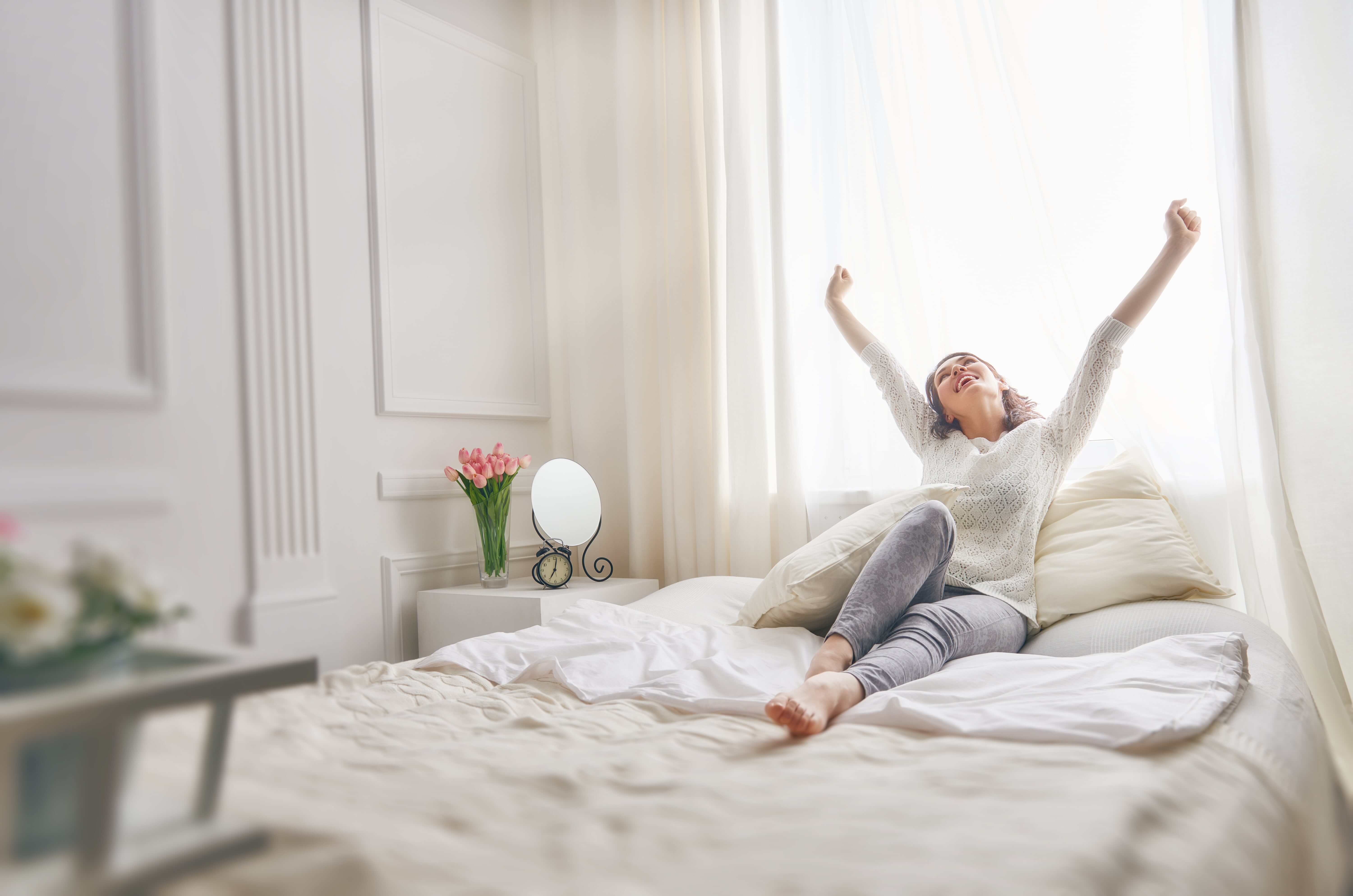 A-woman-relaxing-by-the-bed