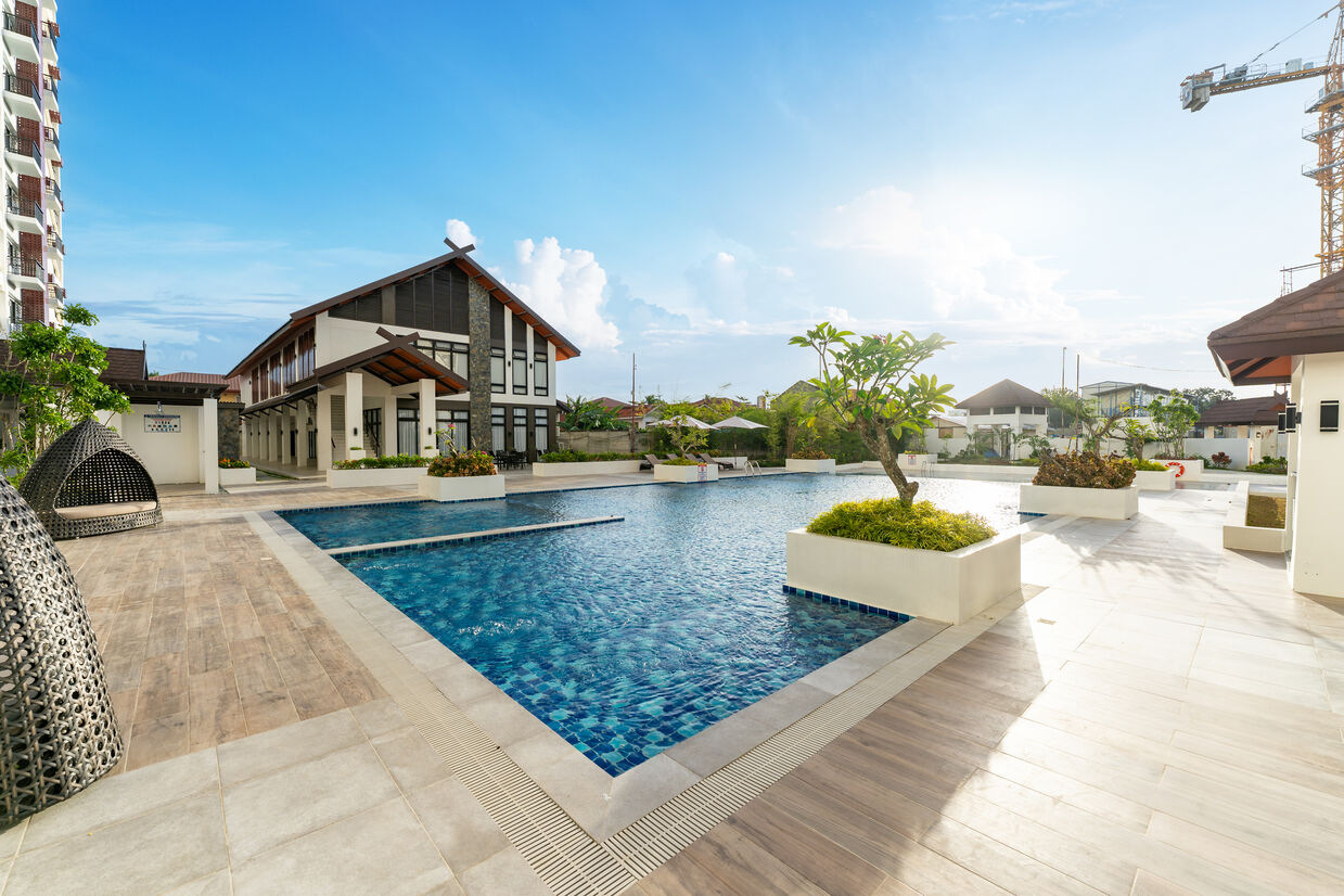 Beautiful sunny day by the swimming pool and clubhouse of Royal Oceancrest Mactan